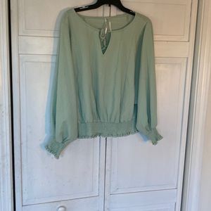 Anthropologie blouse in gorgeous Sea-foam green.